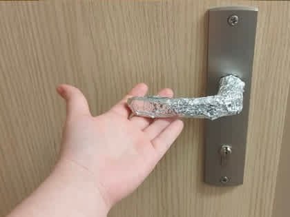 wrap foil around door knob when alone - Sheds Homes