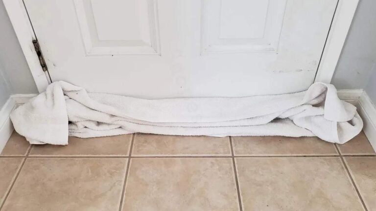 towel under hotel door